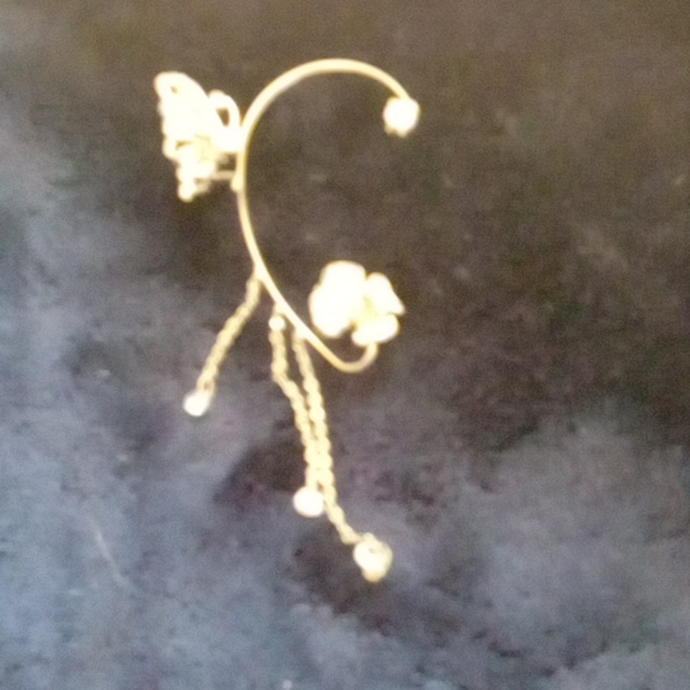 Silver right and left ear cuff butterfly at top flower on bottom - Picture 3 of 4